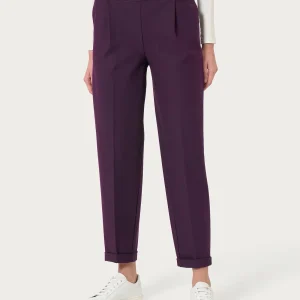 Pantalone a carota con tasche e pinces in Compact - Plum Perfect