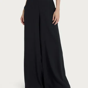 Pantalone a palazzo con tasche in Ecoseta - Nero