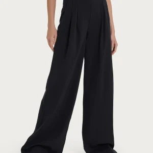 Pantalone palazzo con tasche e pinces in Super Natural - Nero