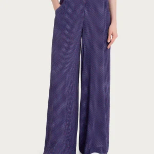 Pantalone a palazzo con tasche e micro pattern in Ecoseta - Fant. Salsa