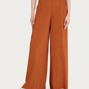 Pantalone a palazzo con tasche e hexagon pattern in Ecoseta - Fant. Red Ochre