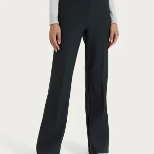 Pantalone flare lungo con tasche in Compact - Oscuro Mel.