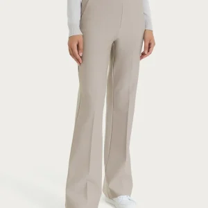 Pantalone flare lungo con tasche in Compact - String